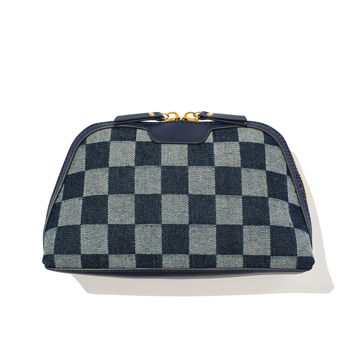 Checkered blue and gray bag with gold zipper on a white background