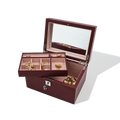 Open jewelry box with gold jewelry on a white background